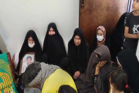 پرچم رضوی در جمع خانواده‌های شهدای فاریاب