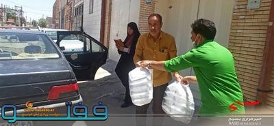 ۳۰۰ پرس غذا توسط حوزه خواهران شهیده اشرف گنجویی بین نیازمندان