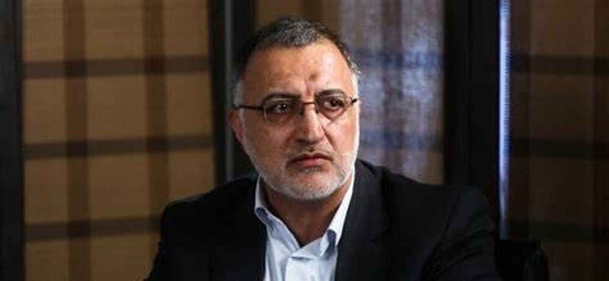 تصویری از زاکانی با پوستر خاتمی در دهه هفتاد