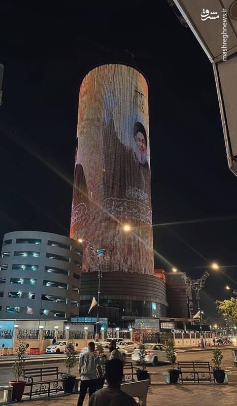 تصویر شهید نصرالله بر روی مرکز خریدی در بغداد